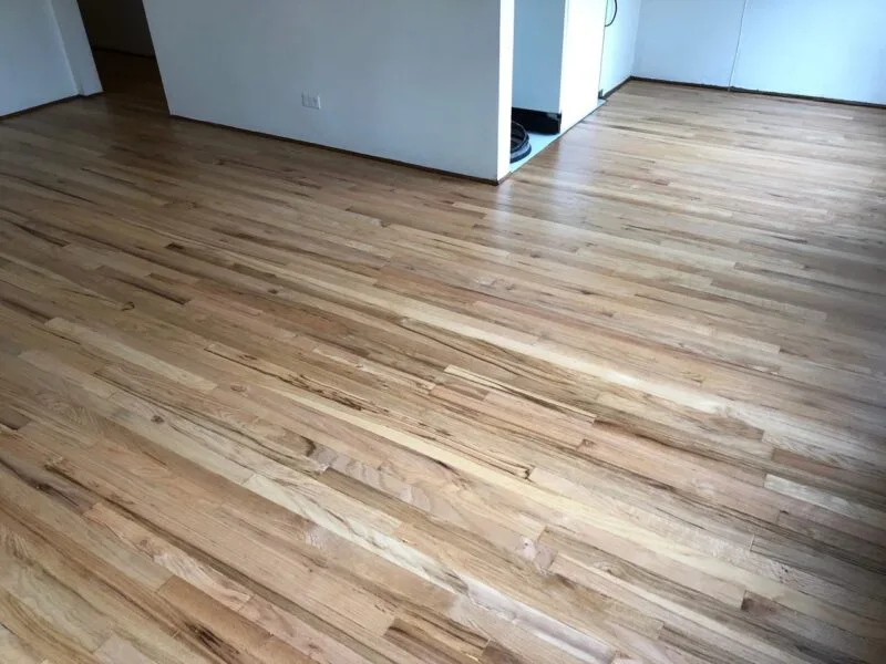 Eco-friendly hardwood floor restoration with water-based finishes