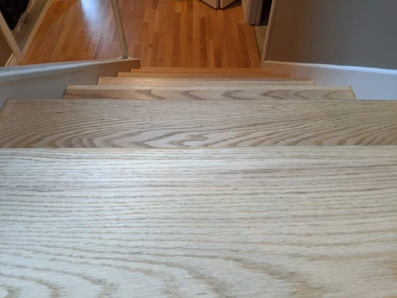 Before and after: deep scratches removed from hardwood stairs with diamond abrasives